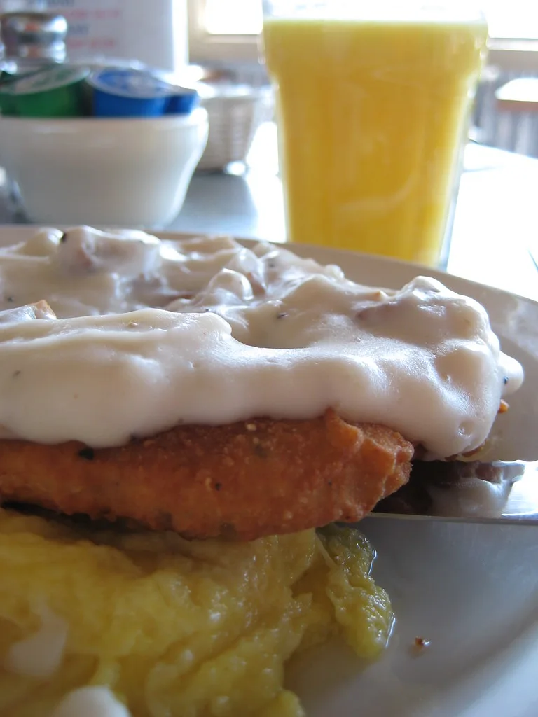 Texas Roadhouse Country Fried Chicken — hand-battered fried chicken breast topped with housemade cream gravy