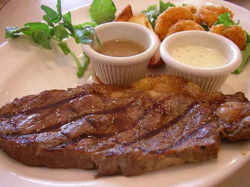 Texas Roadhouse Ribeye and Grilled Shrimp Combo — 12oz ribeye with grilled shrimp skewer surf and turf