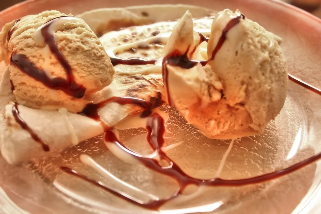 Signature honey cinnamon butter served with fresh baked rolls